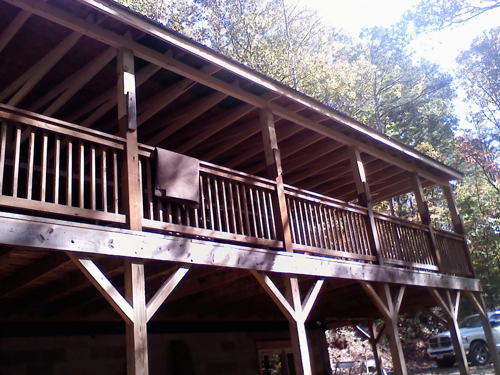 Timber framing under a new elevated porch and deck — Roof Leak Repair in Barco by Roofing Brothers